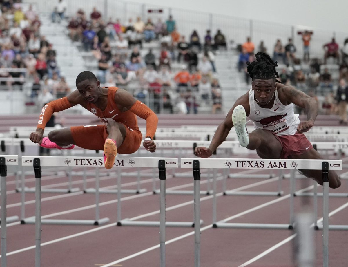 Junior Kendrick Smallwood jumps the final hurdle in the 60-meter hurdle event at the SEC Indoor Track and Field Championships on March 1, 2025.