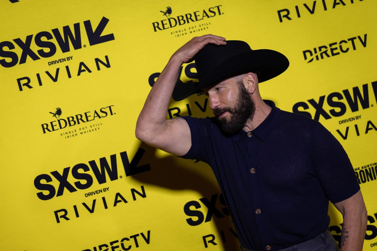 Jon Bernthal poses on the red carpet at The Paramount Theatre for the premiere of "The Accountant 2" on March 8, 2025.