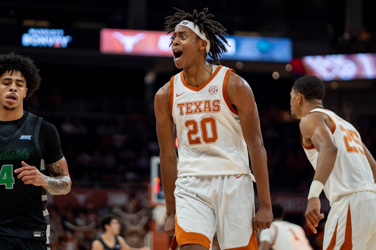 Freshman guard Tre Johnson celebrates a play during Texas' game against Chicago State on Nov. 12, 2024.