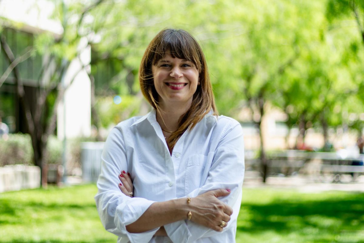 Meg Griffiths, filmmaker and UT alumna, poses for a portrait outside of the Moody College of Communication on April 9, 2025.