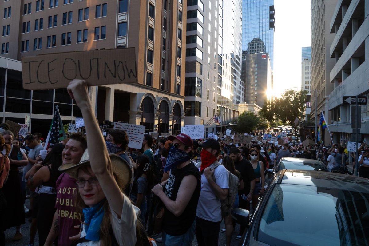 Protesters march through 7th Street on June 9, 2025.